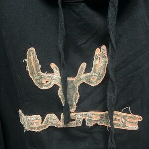 Realtree- black hoodie with camo and orange chest logo